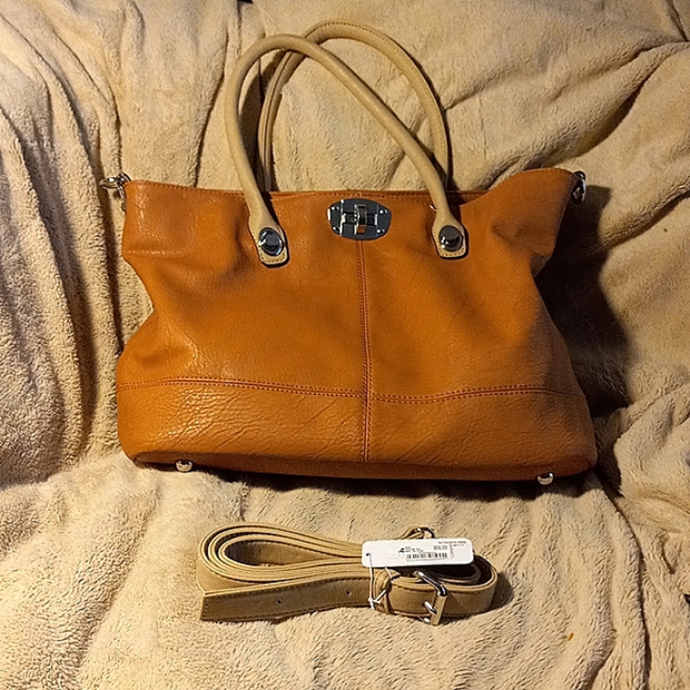 Charming Charlie faux leather rust colored handbag.